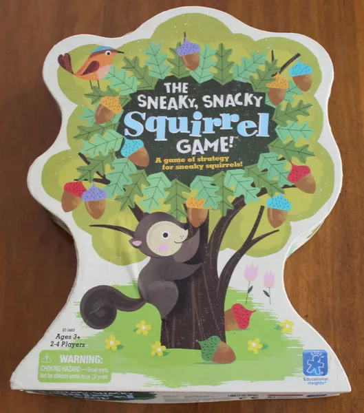  Sneaky Snacky Squirrel Game with squirrel tweezers and colorful acorns for fine motor skill development